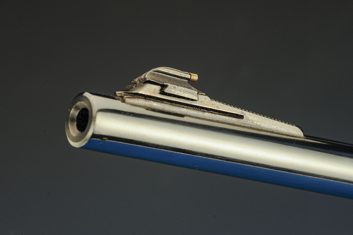 The front sight is a ramped design with a gold bead. The muzzle is target faced and finished smooth.